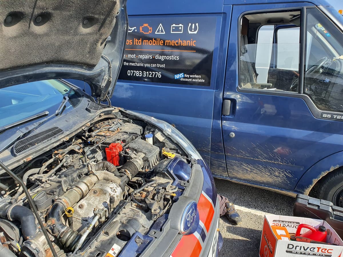 Mechanic working on a car